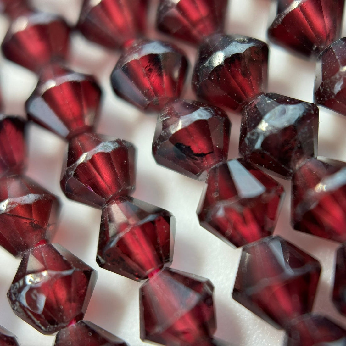 January birthstone - Garnet with Space Ship shape and faceted finish