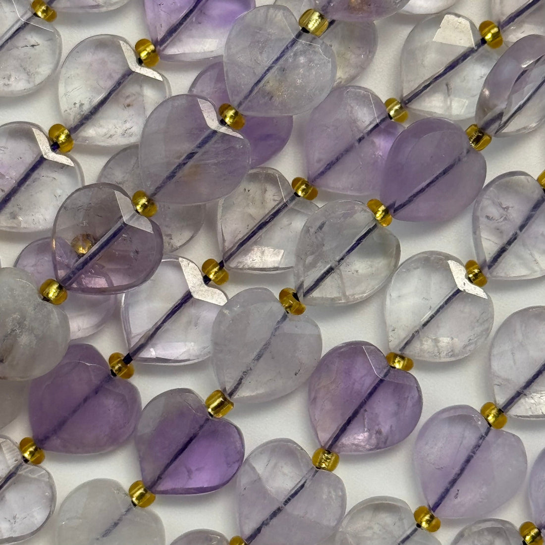 Lavender Amethyst or Light Amethyst in Heart Shape and Faceted Finish as a birthstone