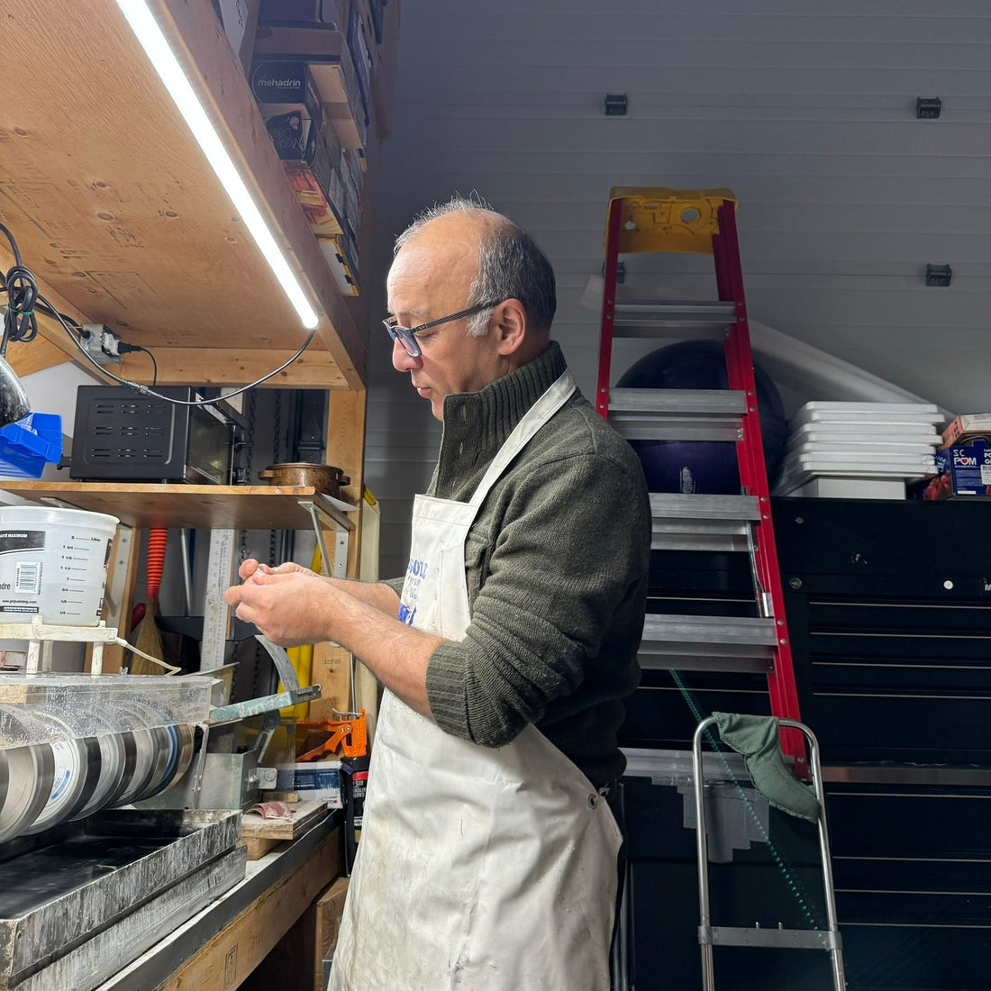 inside a Jewelry Caft Supplies of Canada Located in Ontario - Reza Piroznia Stone in Hand after Lapidary
