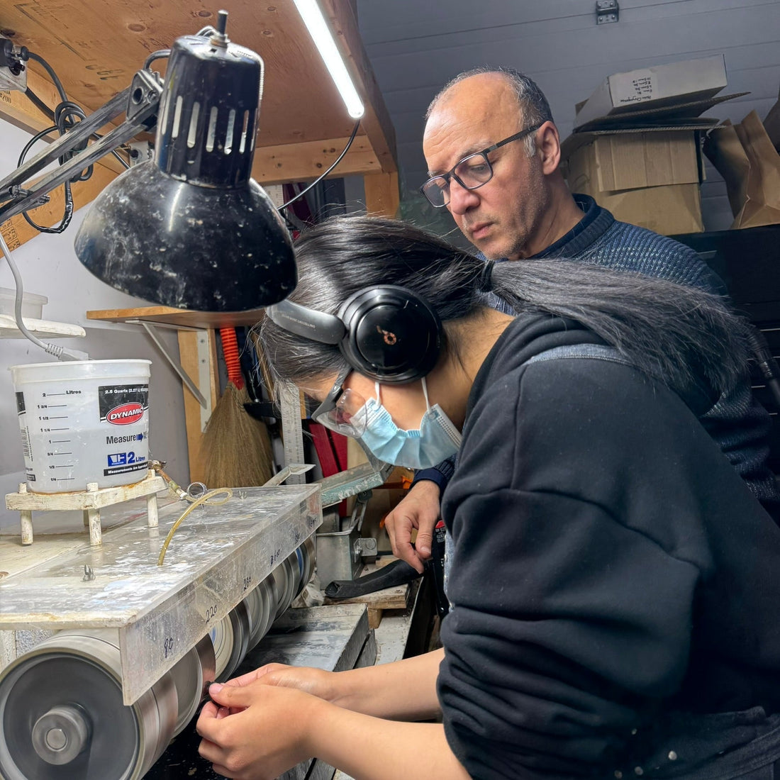 Reza Piroznia Teaching George Brown College Student How to do lapidary on a labradorite stone
