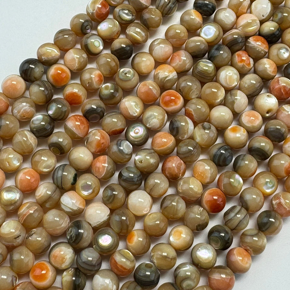 orange rainbow shell mother of pearls stone beads in polished finish and round shape