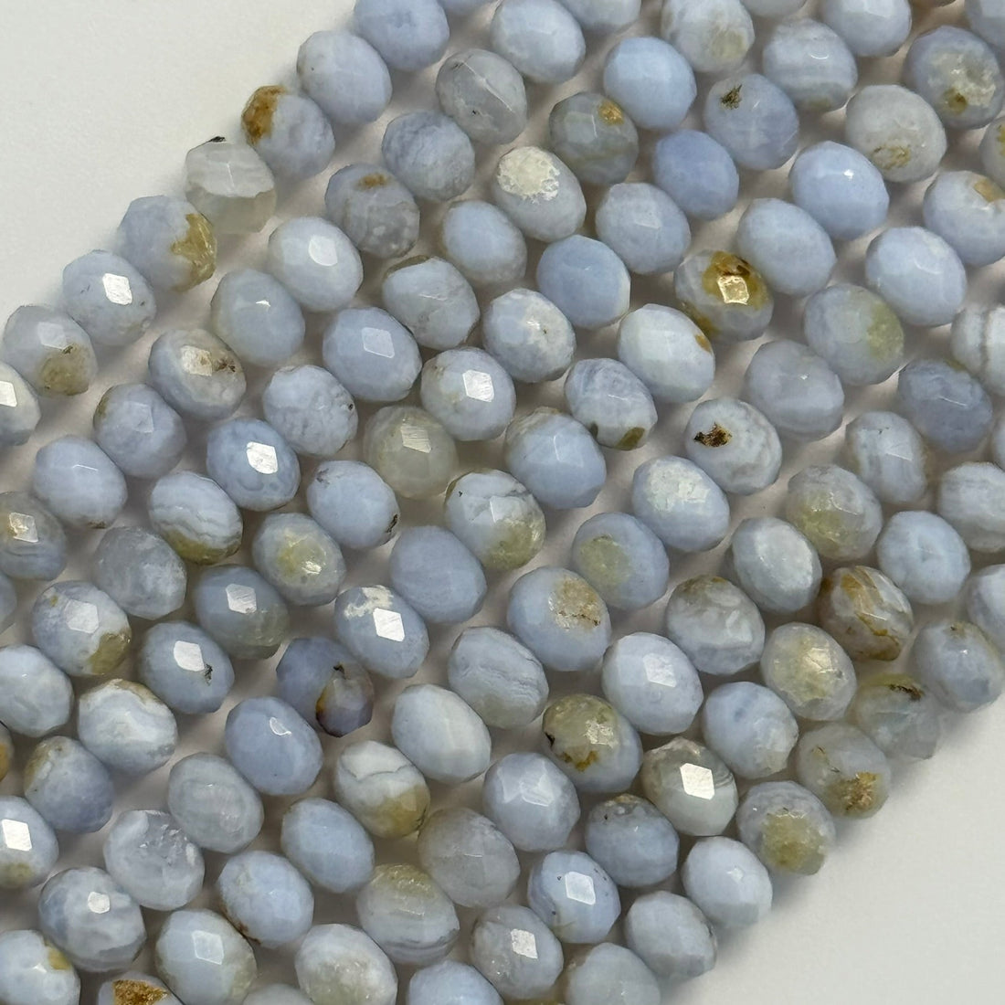 Natural Blue lace agate gemstone beads in rondelle shape and faceted finish