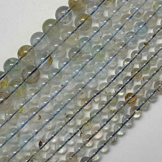 Topaz Polished Round Beads