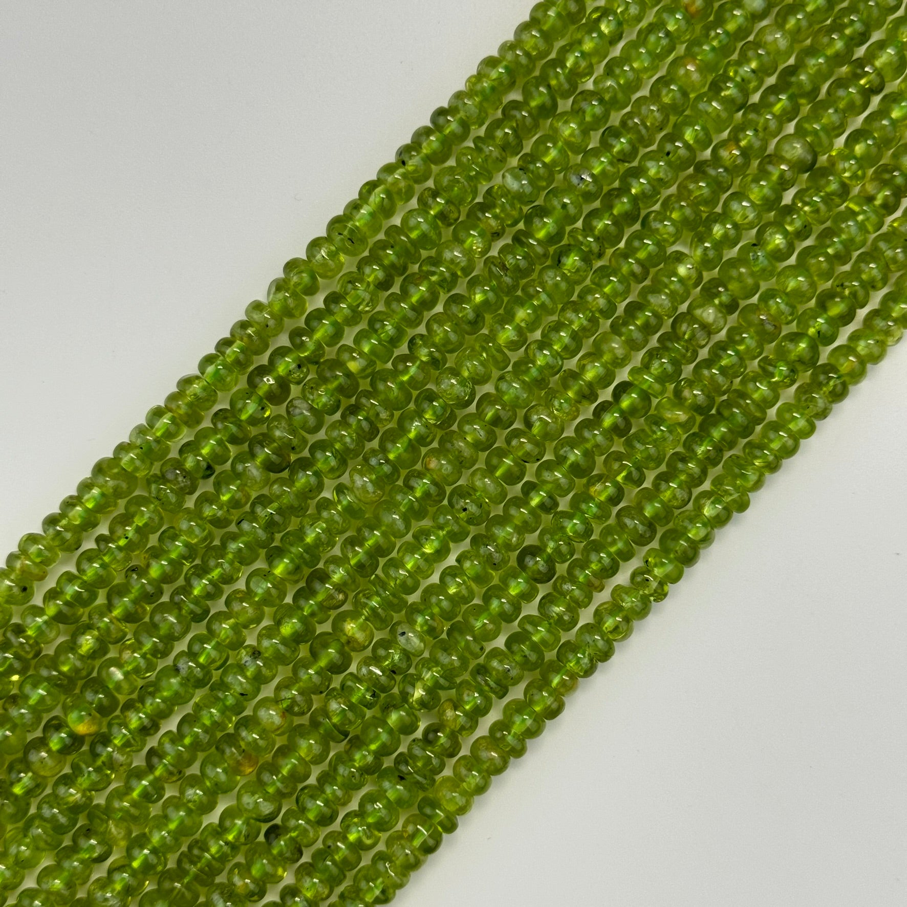 Peridot AA Rondelle Polished Beads image 0