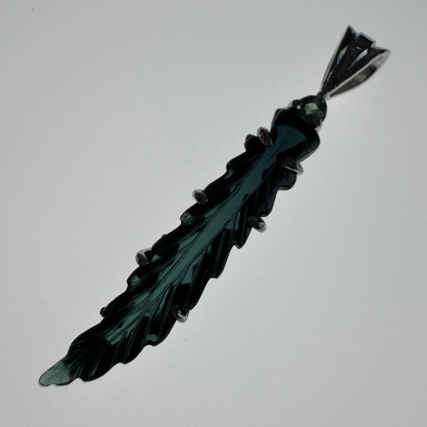 Hand carved blue Tourmaline earring from Brazil, set in sterling silver 925