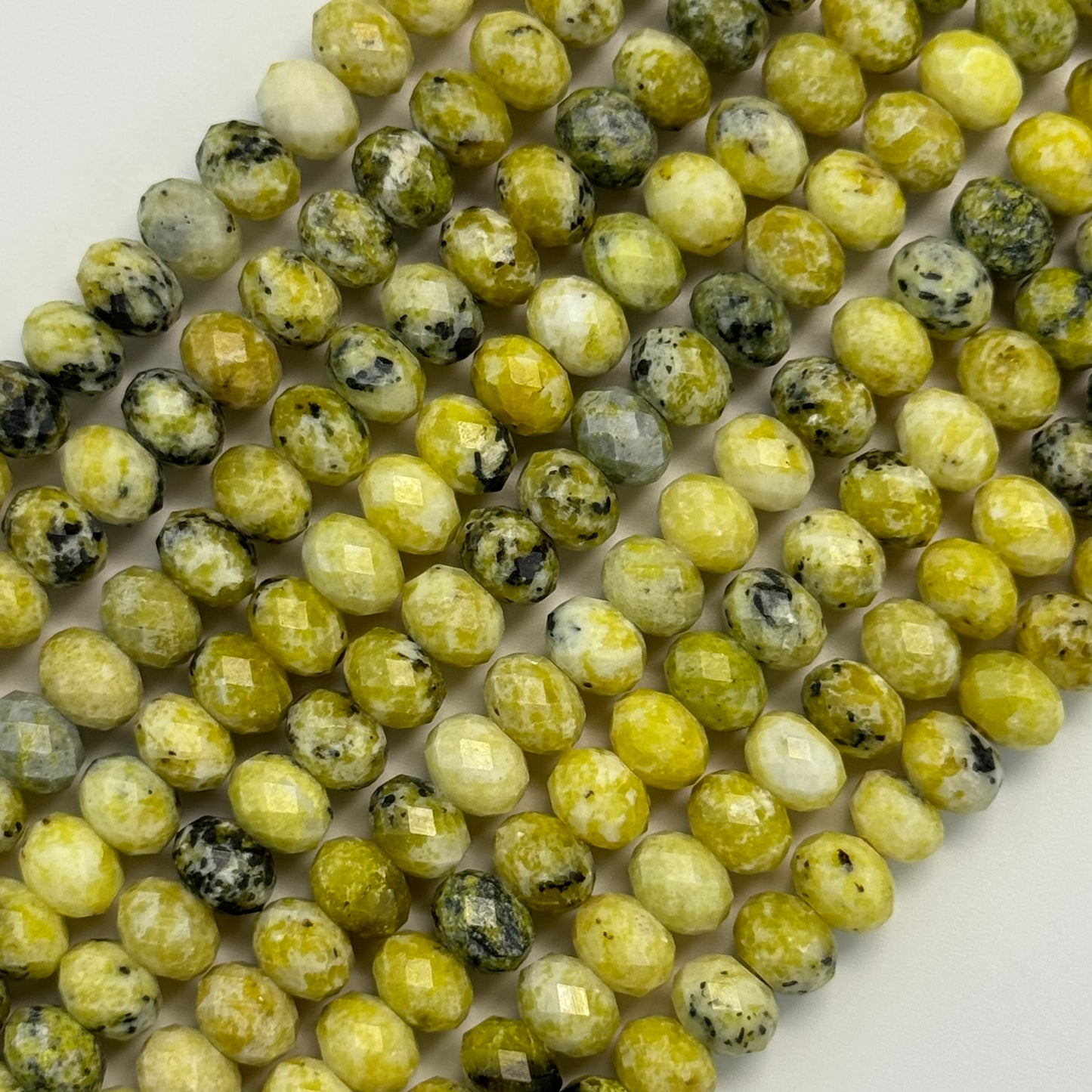 Faceted Dendritic Serpentine Rondelle Beads