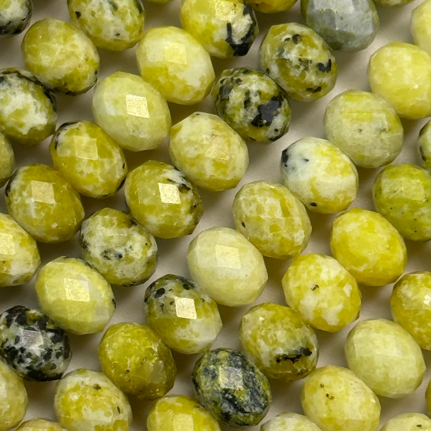 Faceted Dendritic Serpentine Rondelle Beads