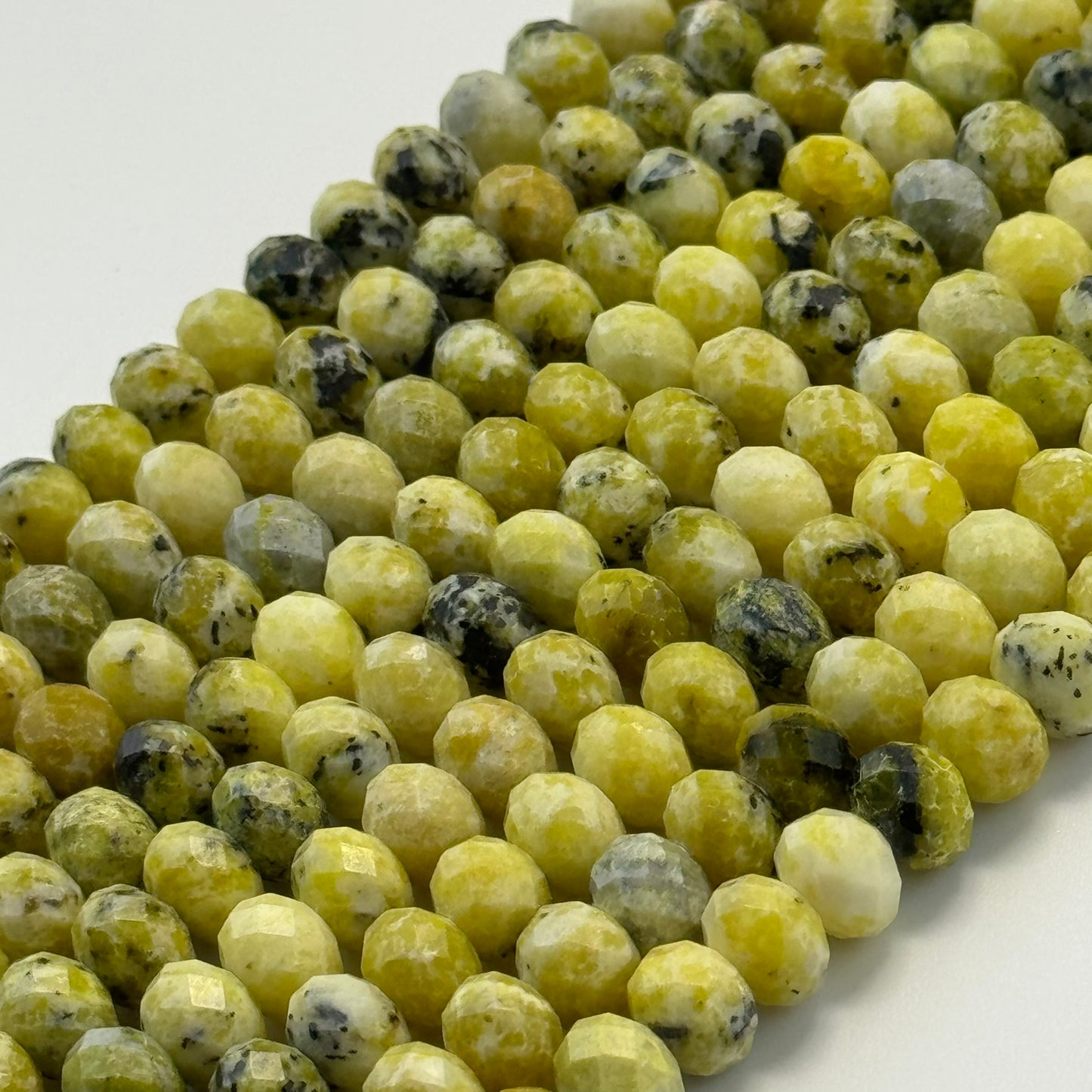 Faceted Dendritic Serpentine Rondelle Beads