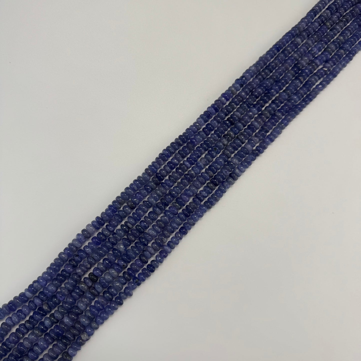 Polished Tanzanite Rondelle Beads – Premium Natural Gemstone