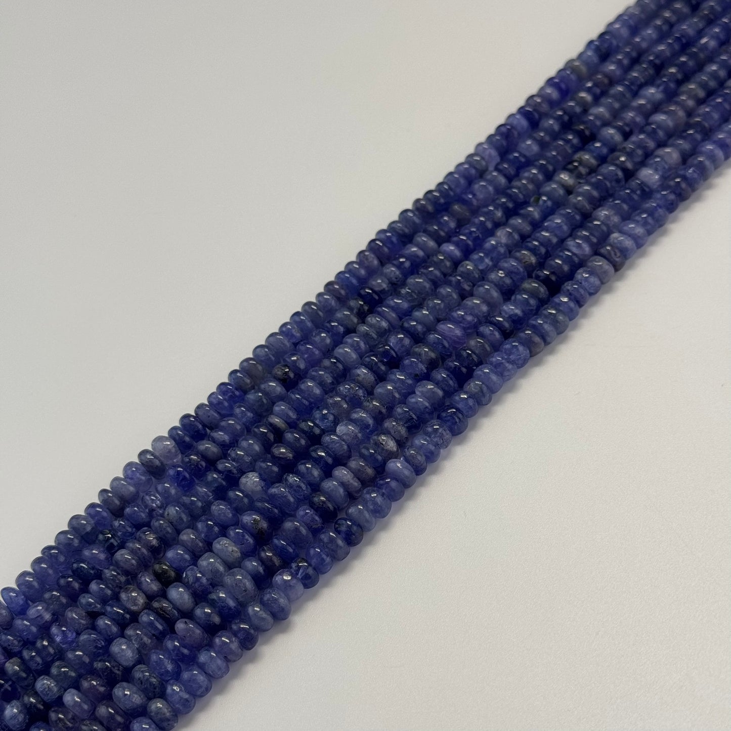 Polished Tanzanite Rondelle Beads – Premium Natural Gemstone