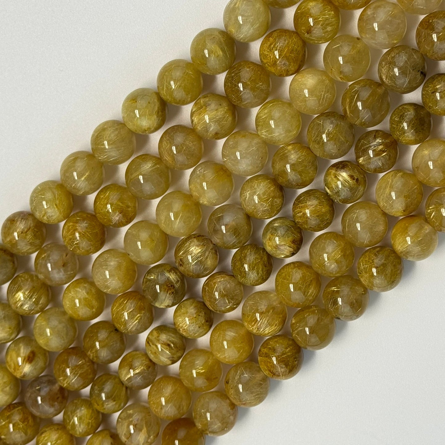 Golden Rutilated Quartz Polished Round Beads (AAAA Quality)