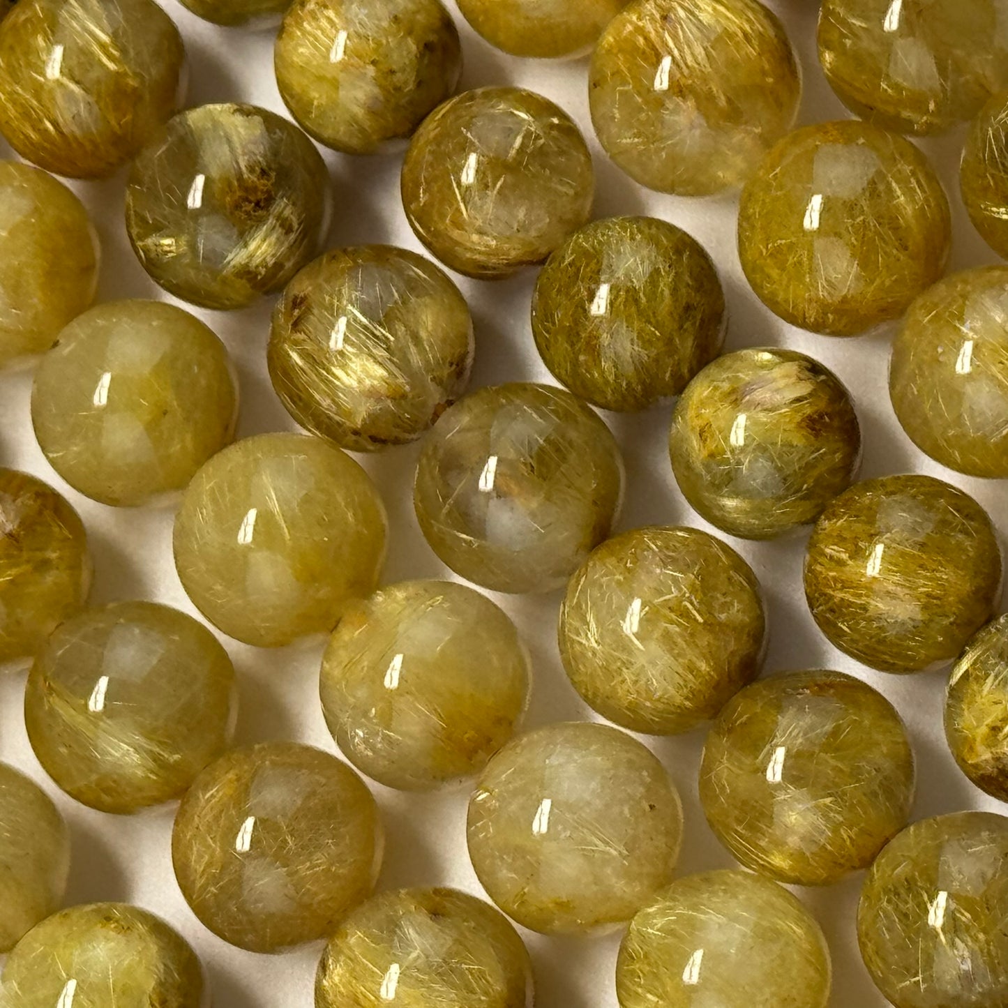 Golden Rutilated Quartz Polished Round Beads (AAAA Quality)