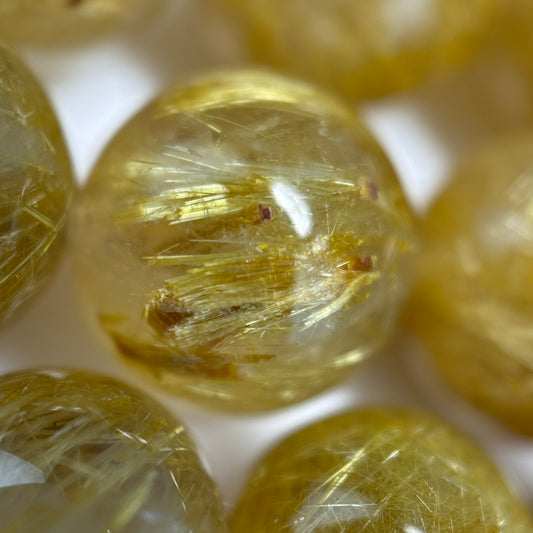 Golden Rutilated Quartz Polished Round Beads - (AAAA Quality)