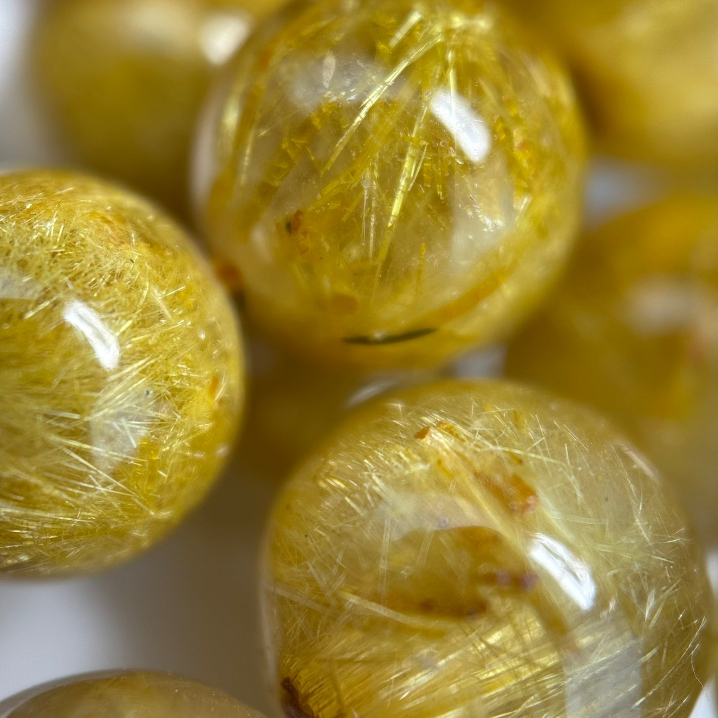 Golden Rutilated Quartz Polished Round Beads (AAAA Quality)