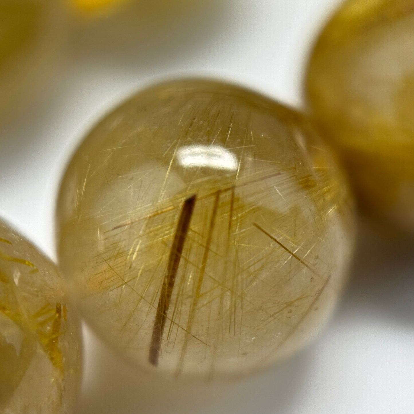 Golden Rutilated Quartz Polished Round Beads (AAAA Quality)