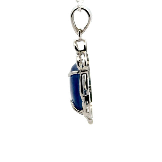 Oval-shaped Kyanite Pendant with Flower Top – Handmade 925 Sterling Silver Design