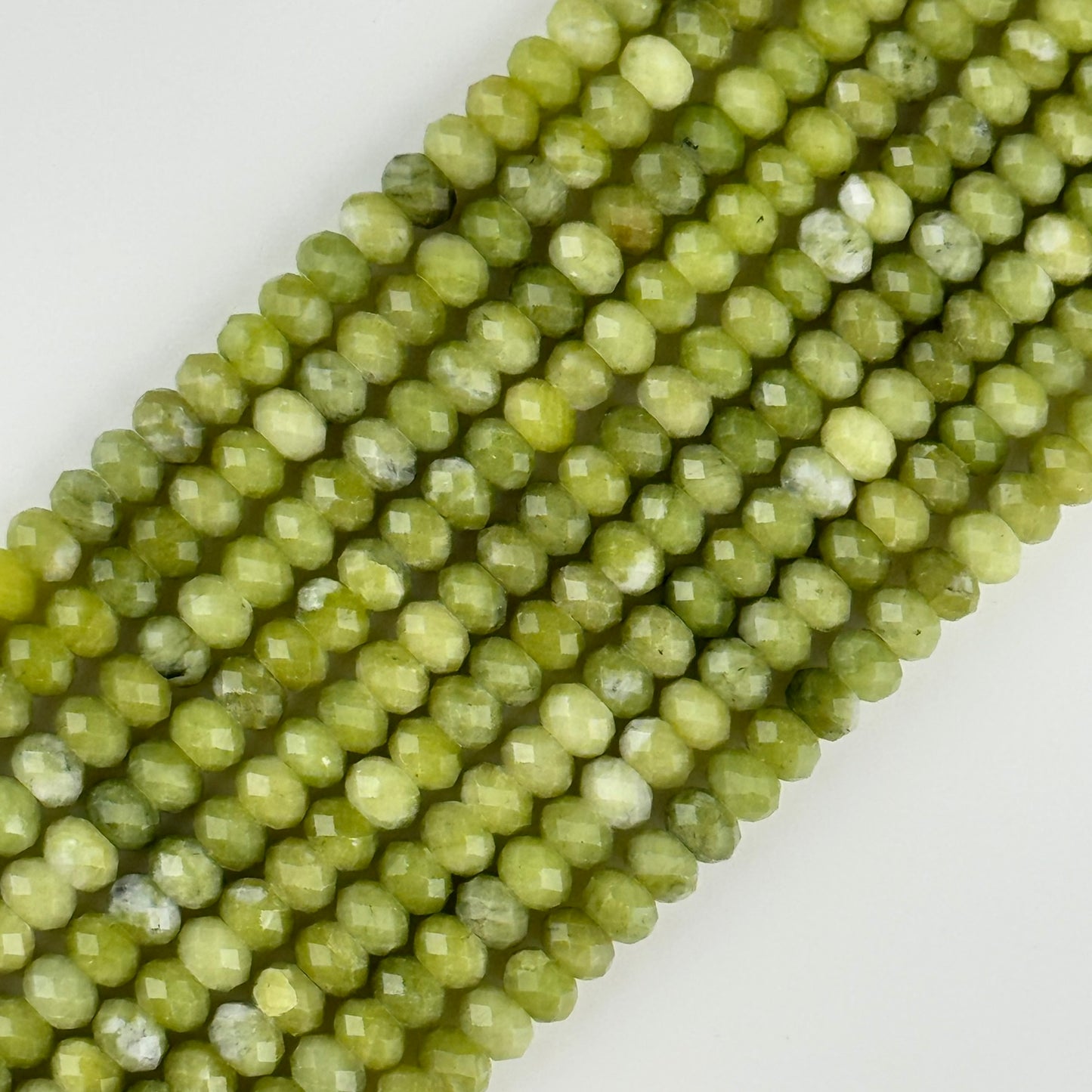 Serpentine Faceted Rondelle Beads (6x4mm) image 0