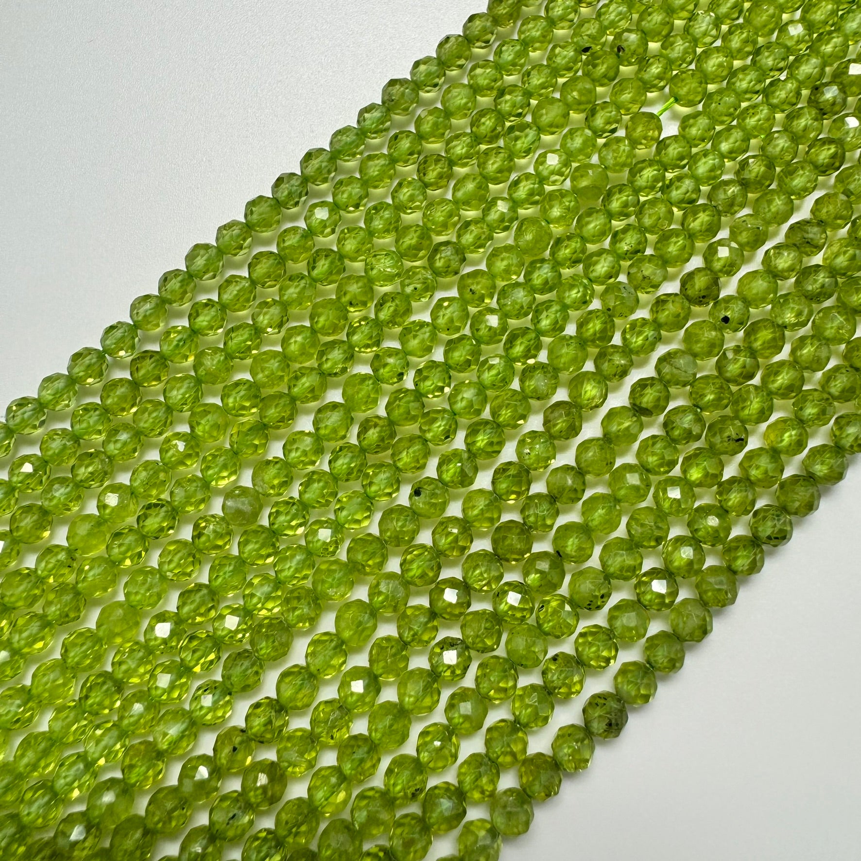 Peridot Faceted Round Beads image 0