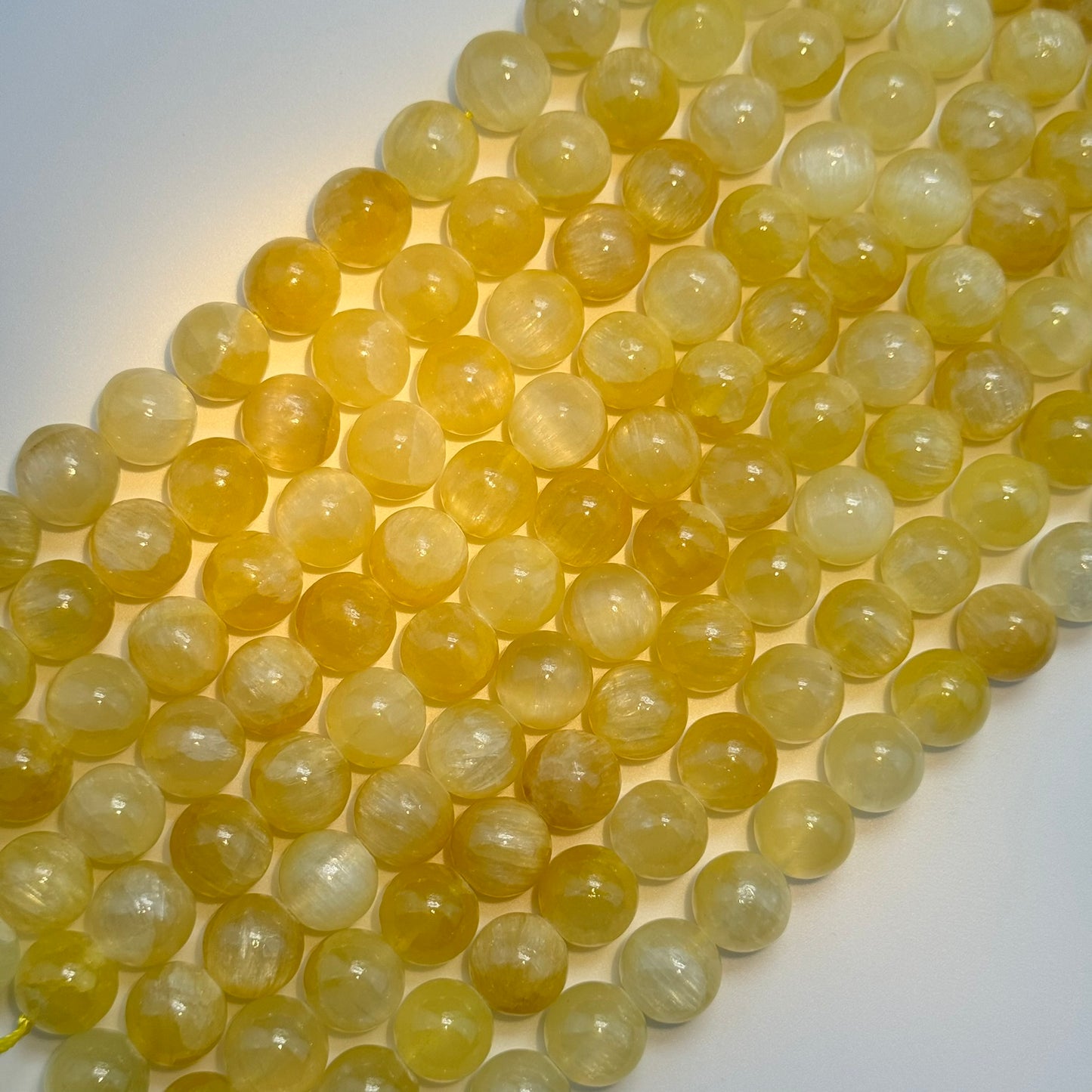 Golden Cat's eye Calcite Polished Round Beads image 5
