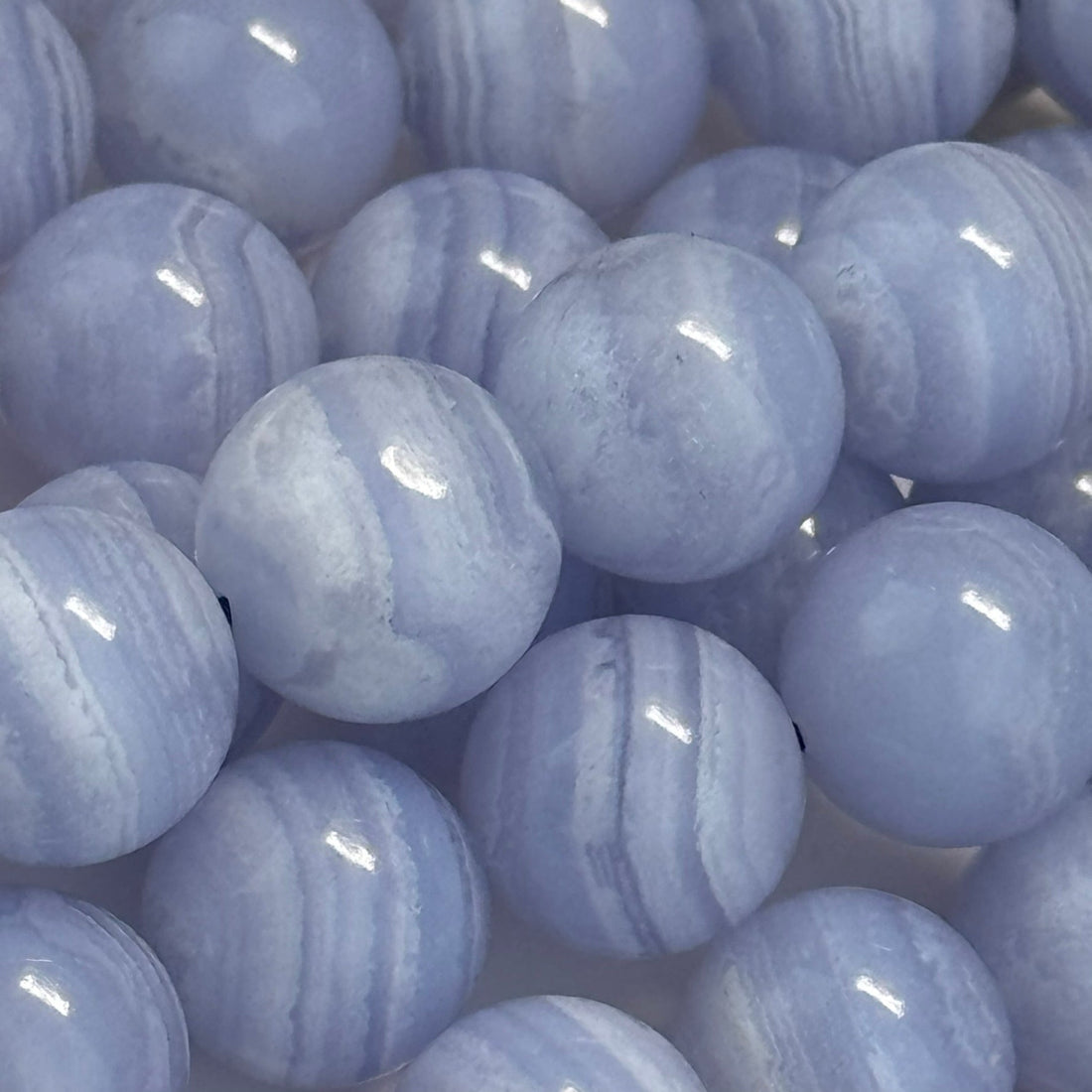 Blue lace agate gemstone beads in round shape and polished finish