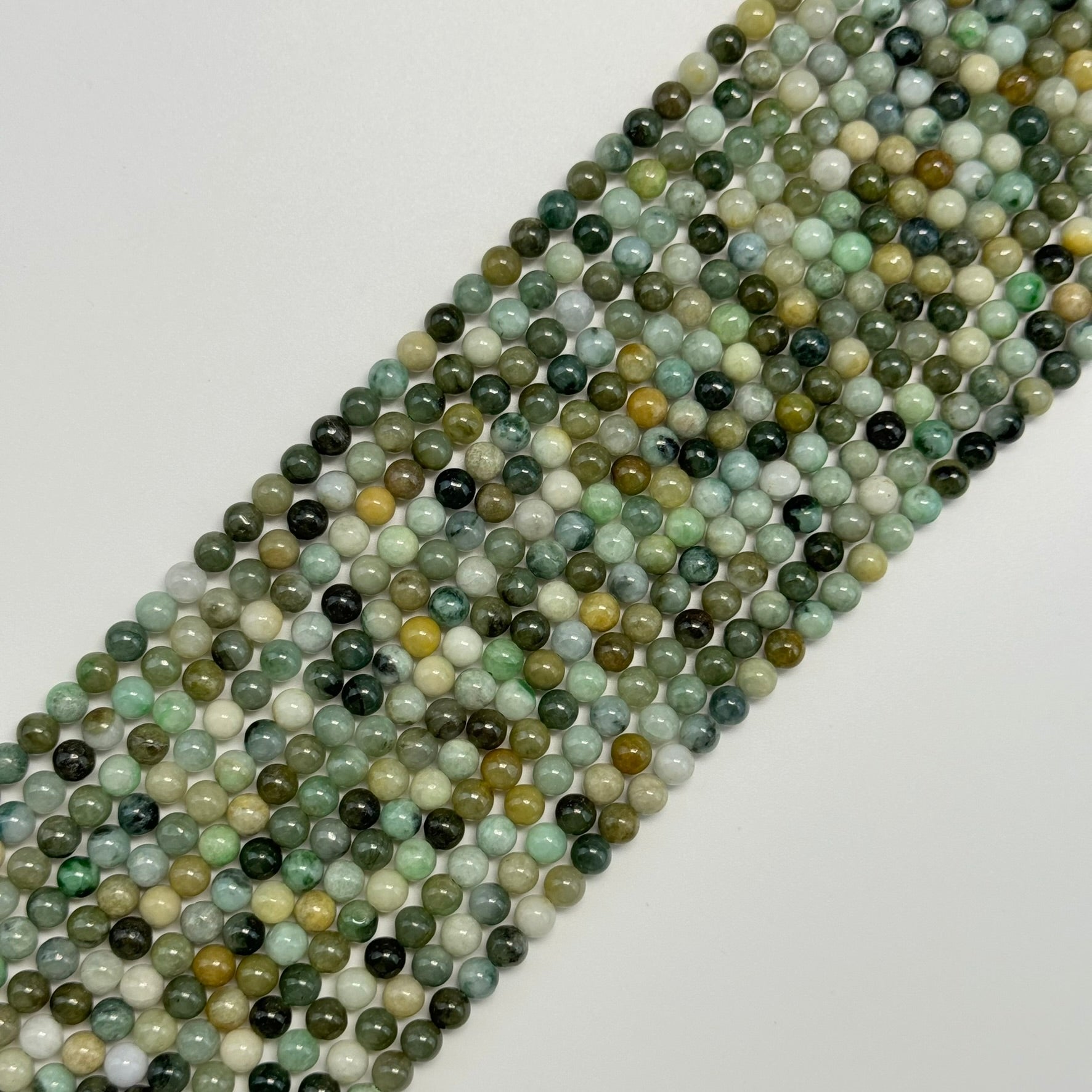Jade Inclusions: Mottling, Veins & Grain - Goldsmith's Guide – Reza Gem ...