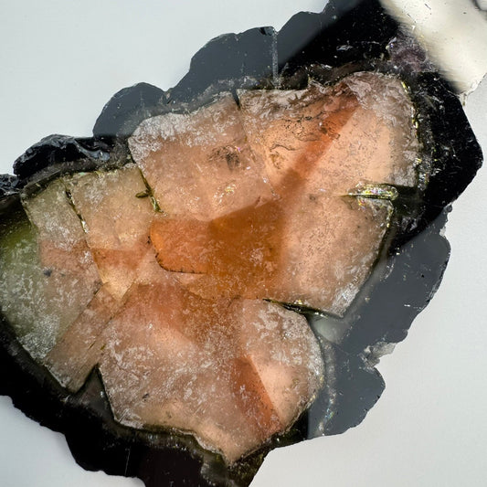 Natural rough tourmaline crystal before cutting into gemstone beads