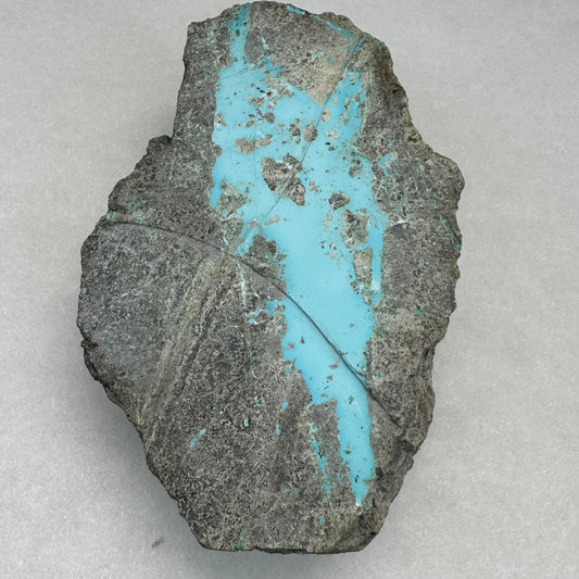 Natural turquoise rough stone before cutting into gemstone beads