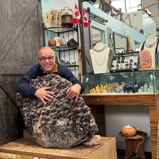 Reza Piroznia with His Amethyst Rock in Green amethyst and purple amethyst color- brought from Brazil - very nice piece of rock amethyst