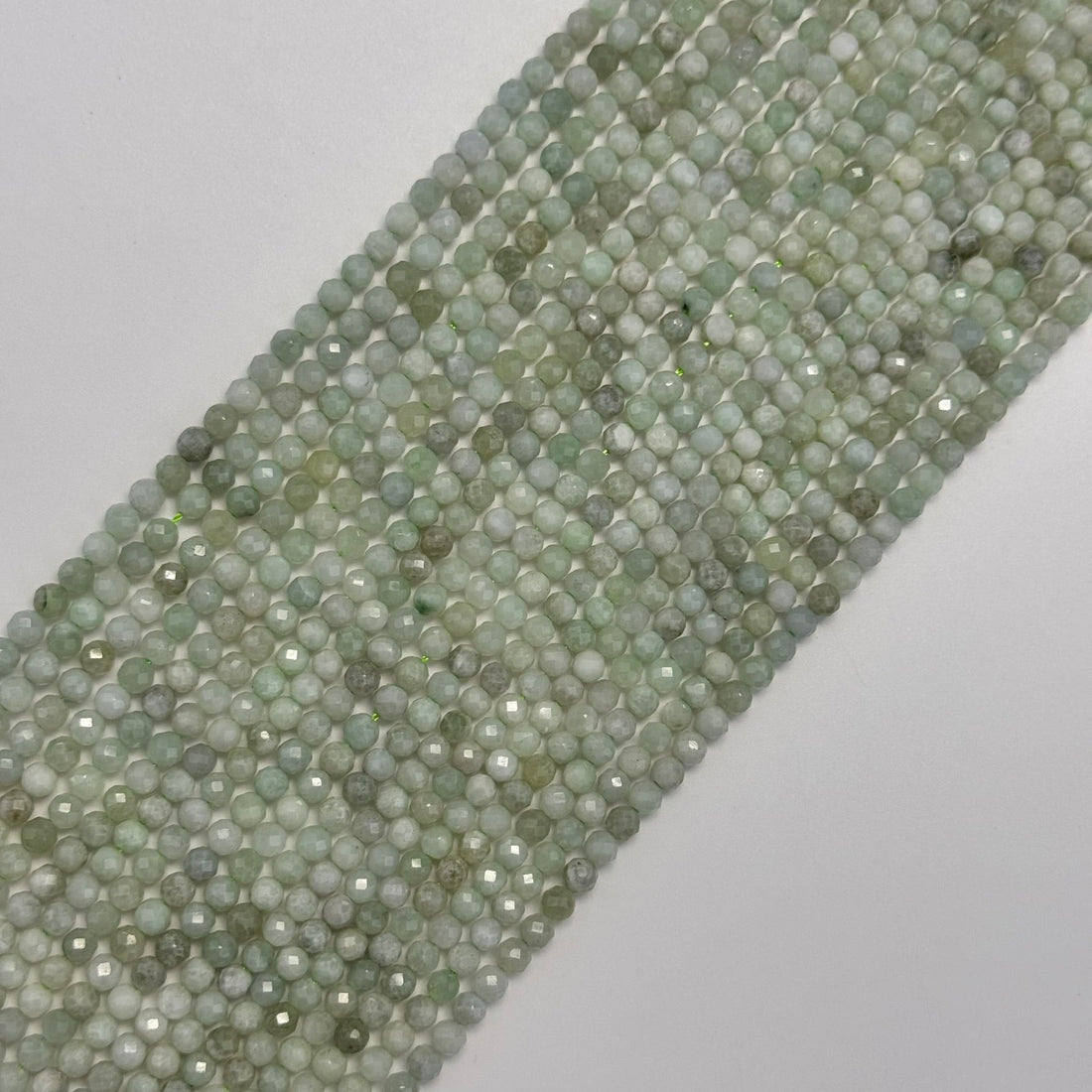 Burmese Green Jade Faceted Round Beads image 0