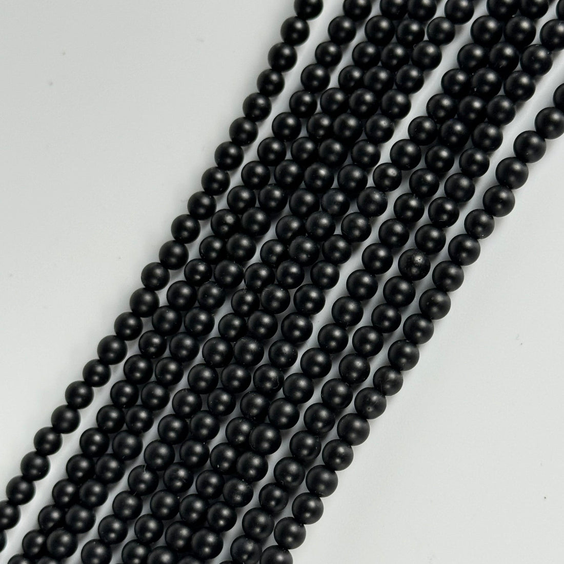 black onyx matte round beads in minimal beaded bracelet design