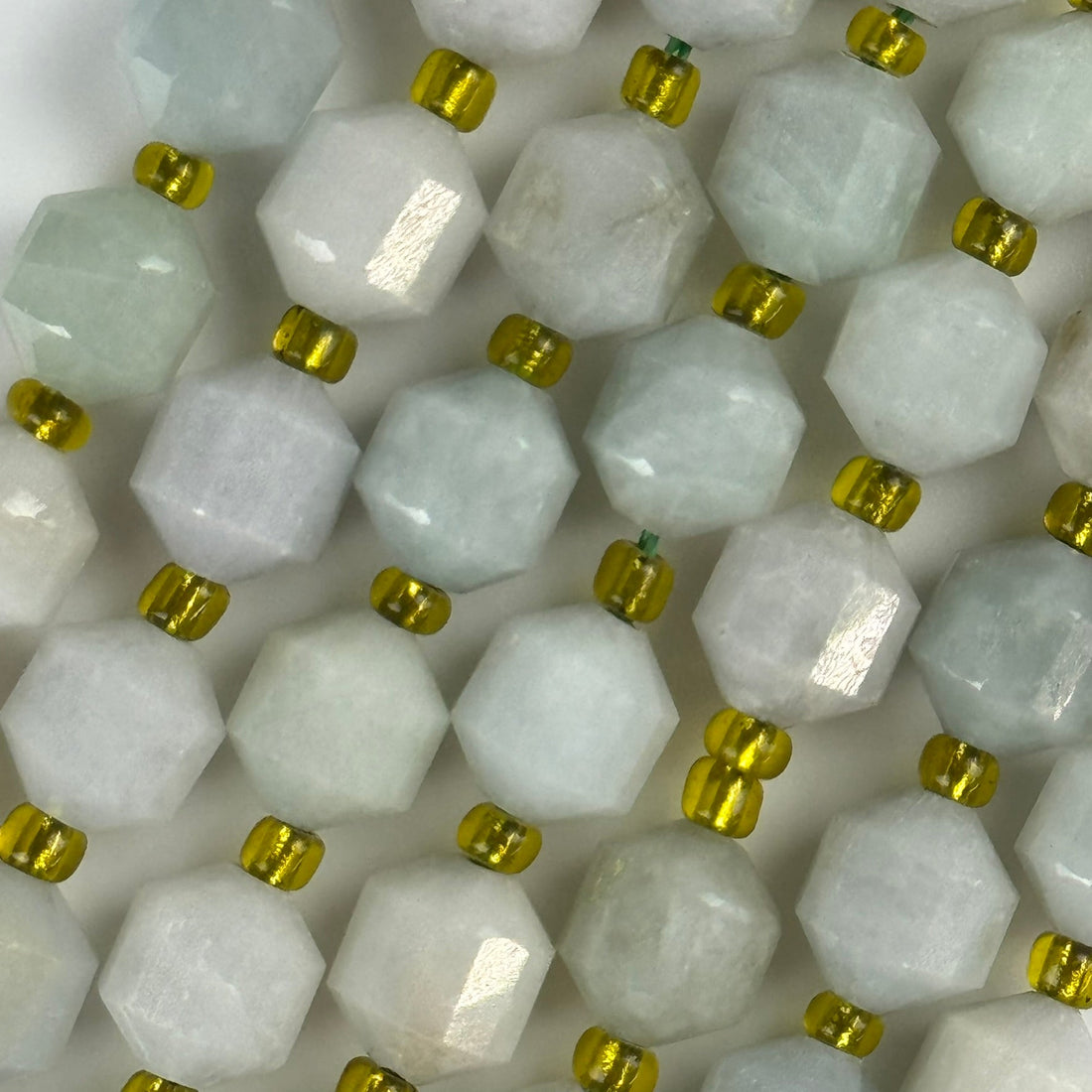 Burmese jade dodecahedron gemstone beads featuring geometric facets for jewelry making