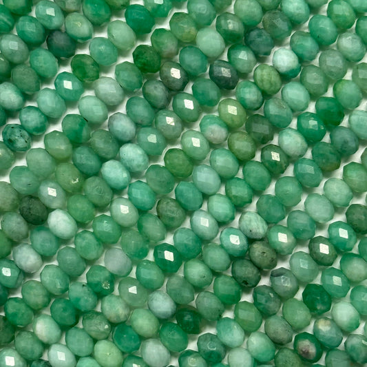 Natural Emerald Faceted Precious Stone Beads - Rondelle Shape displayed as a gemstone bead strand for jewelry making and bracelet design.