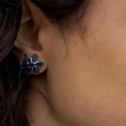 Flower shaped sapphire earrings set in 925 sterling silver with prong settings