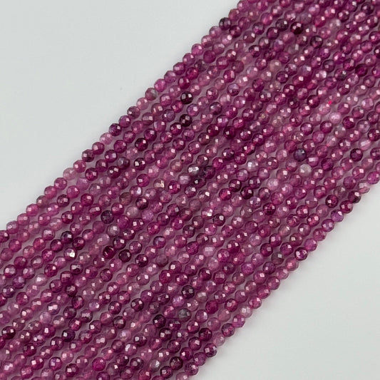 Natural faceted round ruby gemstone beads used in luxury jewelry making