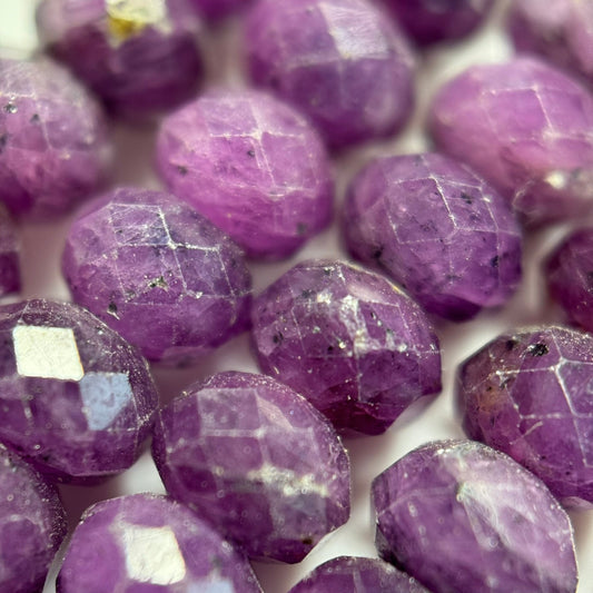 Purple sapphire faceted rondelle beads used in luxury gemstone jewelry making designs