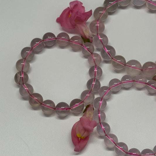 star rose quartz gemstone bracelet with polished beads