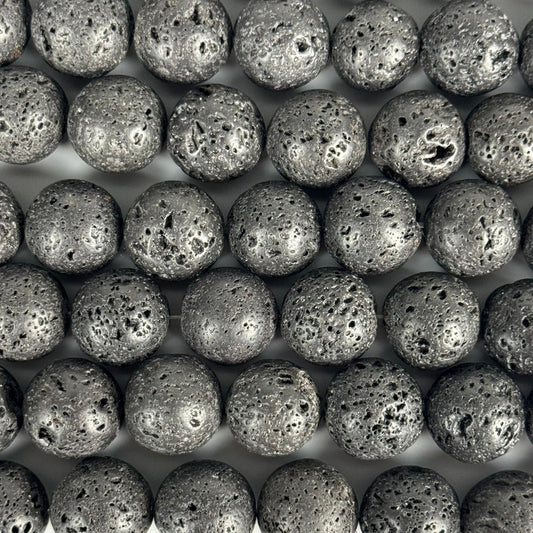 Waxed black lava stone beads with enhanced volcanic texture and rich color