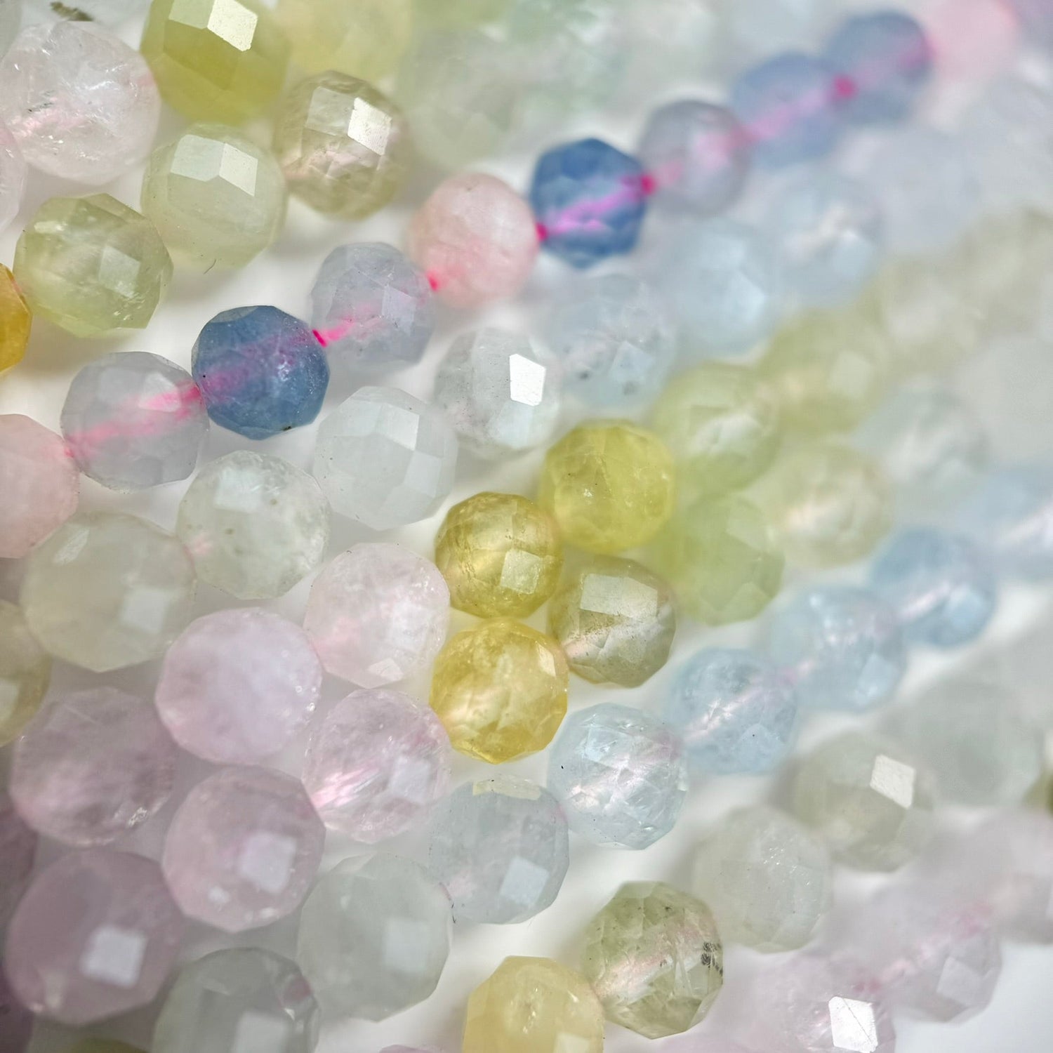 Natural Aquamarine Morganite gemstone beads in soft blue and peach-pink tones for bracelet making, necklaces, earrings, and custom jewelry designs