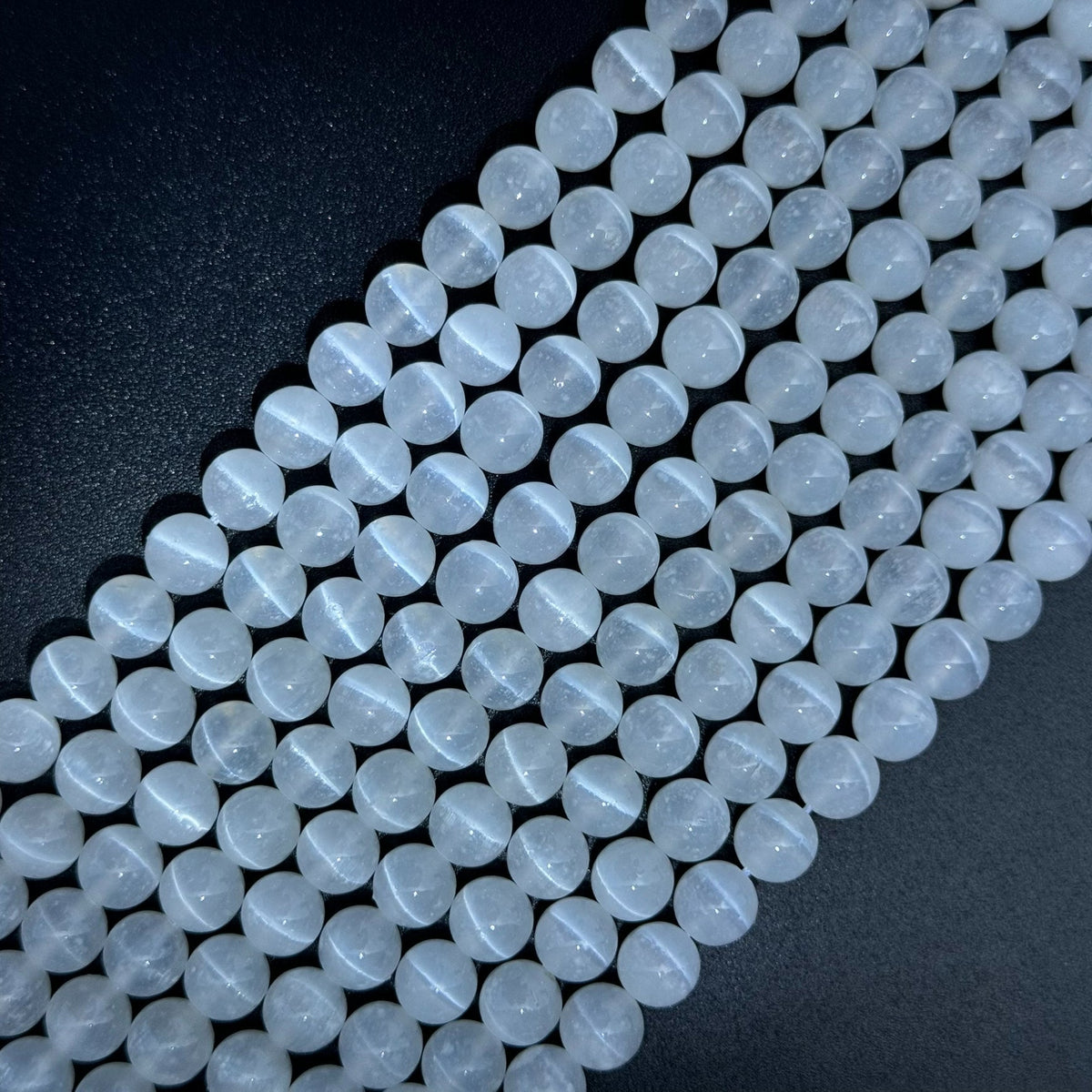 Natural Selenite gemstone beads for jewelry making and bracelet design by Reza Gem Collection.