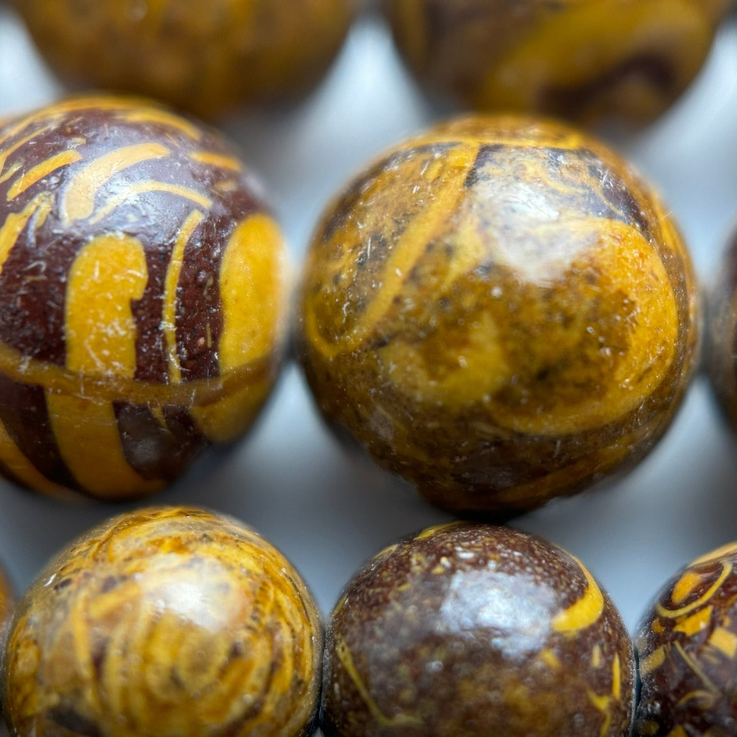 Natural Calligraphy gemstone beads with earthy brown and cream patterns for bracelet making, necklaces, earrings, and custom jewelry designs