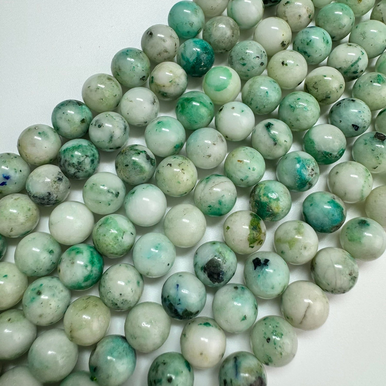 Natural Phoenix Stone gemstone beads for jewelry making and bracelet design by Reza Gem Collection.
