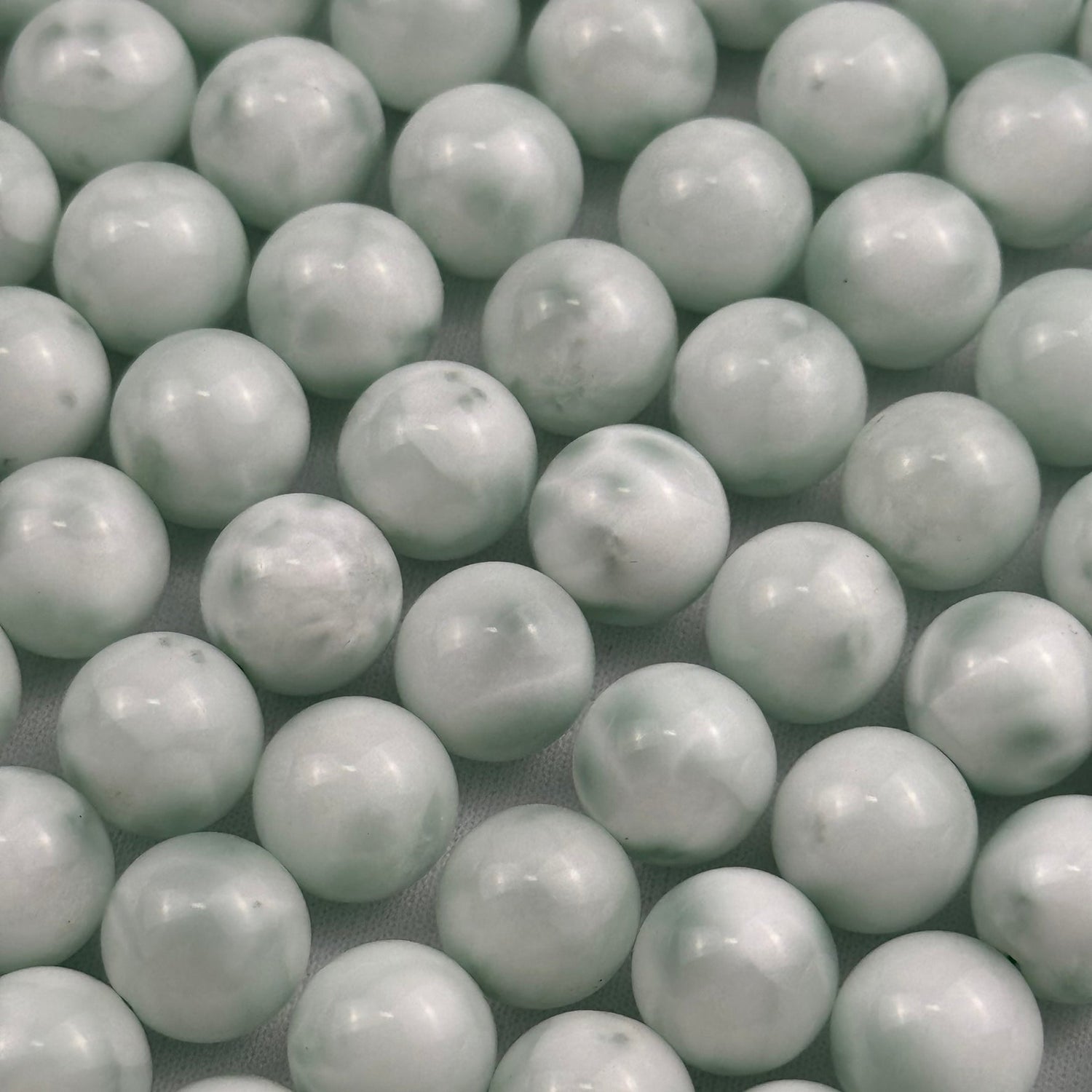 Natural Angelite gemstone beads in soft sky blue tones for bracelet making, necklaces, earrings, and custom jewelry designs