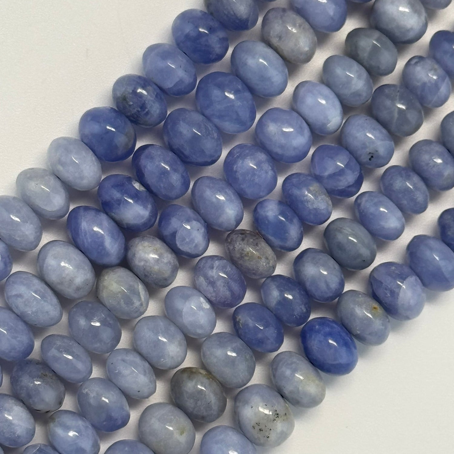 Natural Hackmanite gemstone beads for jewelry making and bracelet design by Reza Gem Collection.