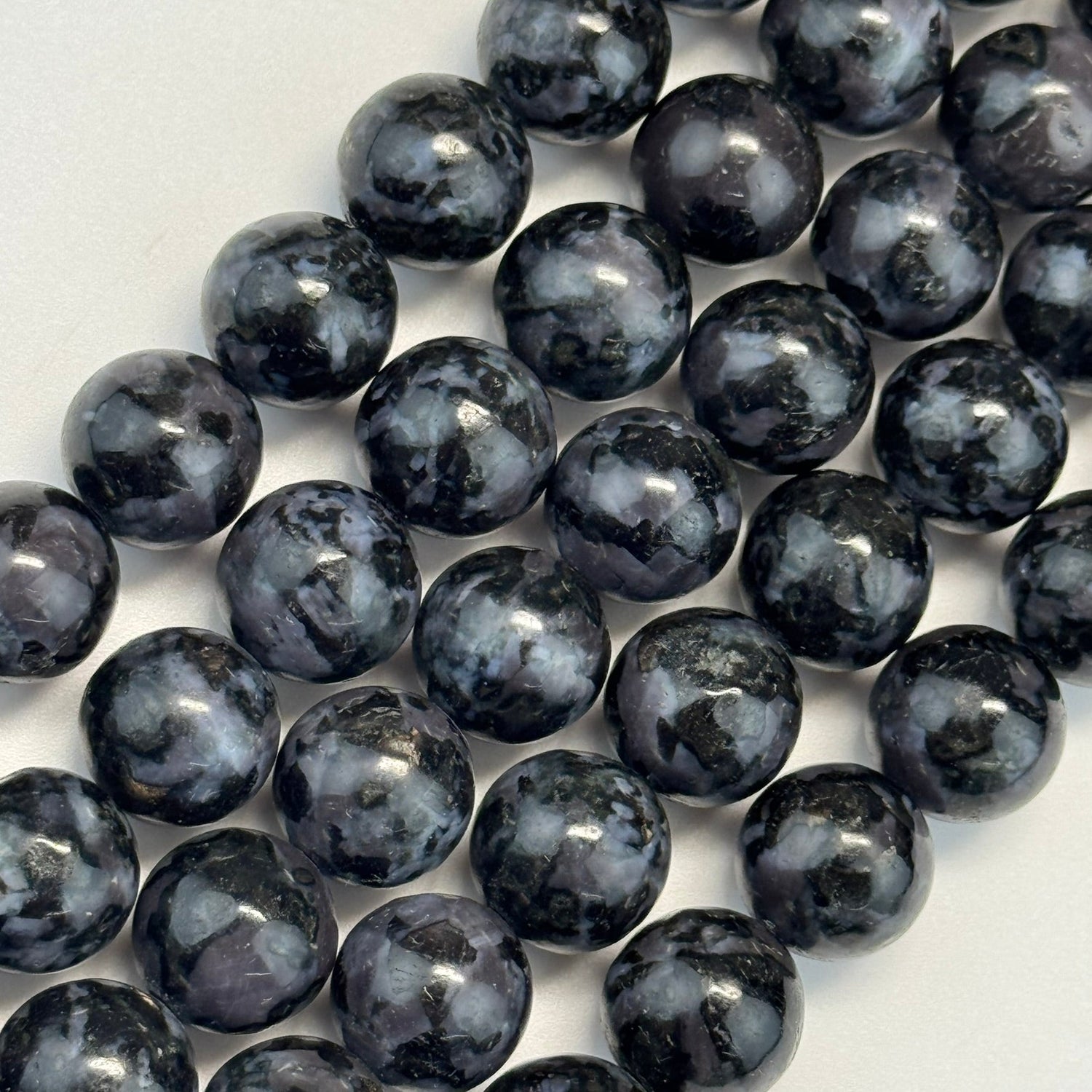Natural Merlinite gemstone beads for jewelry making and bracelet design by Reza Gem Collection.