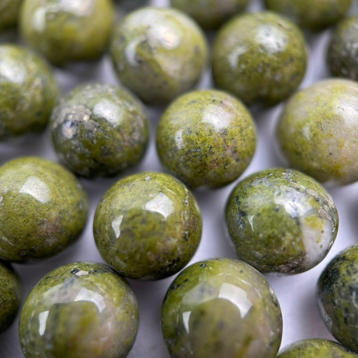 Natural Epidote gemstone beads for jewelry making and bracelet design by Reza Gem Collection.