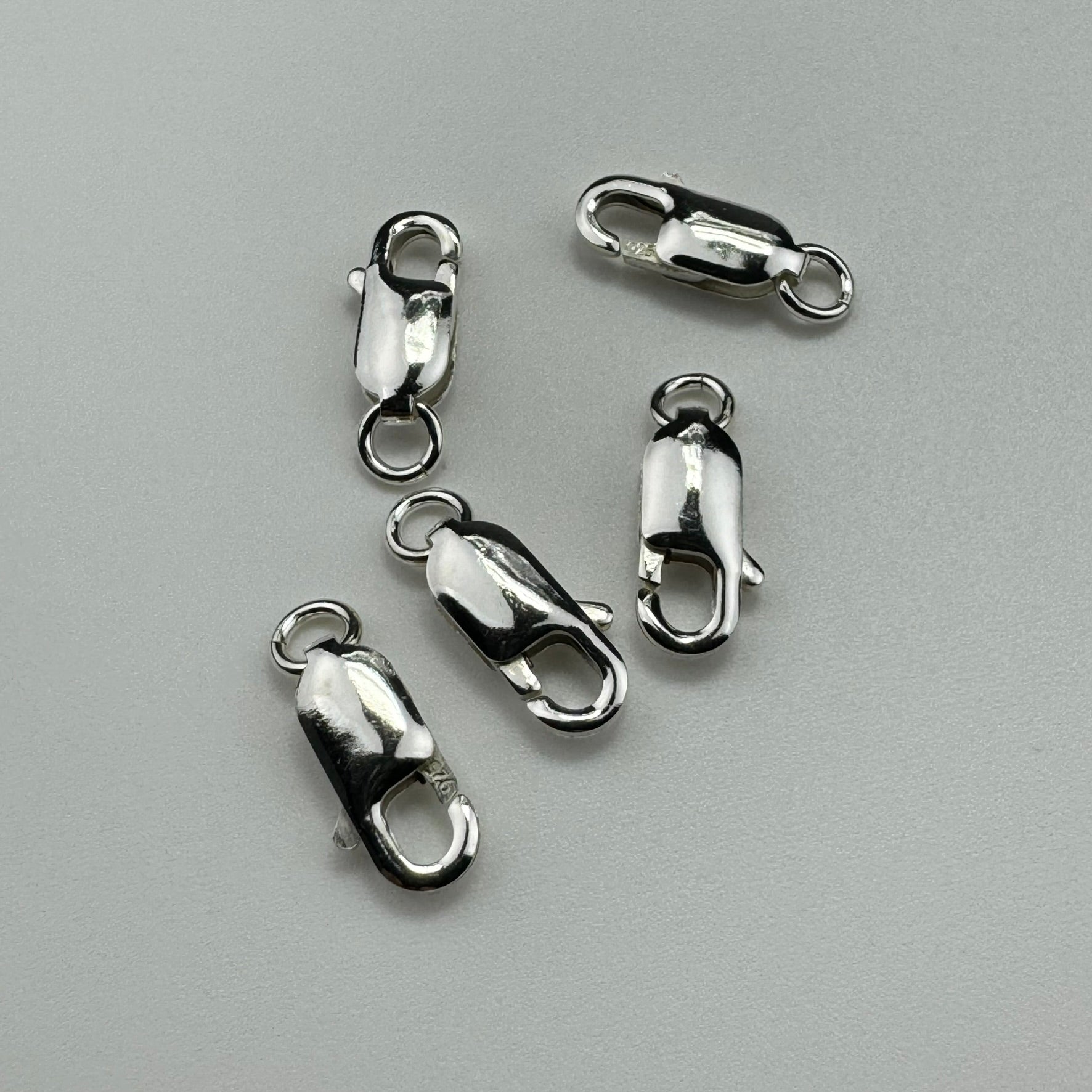 925 Sterling Silver Oblong Lobster Clasp Open Jump Ring (5/pkg) image 0