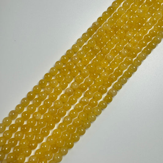 Honey Calcite Polished Round Beads image 0