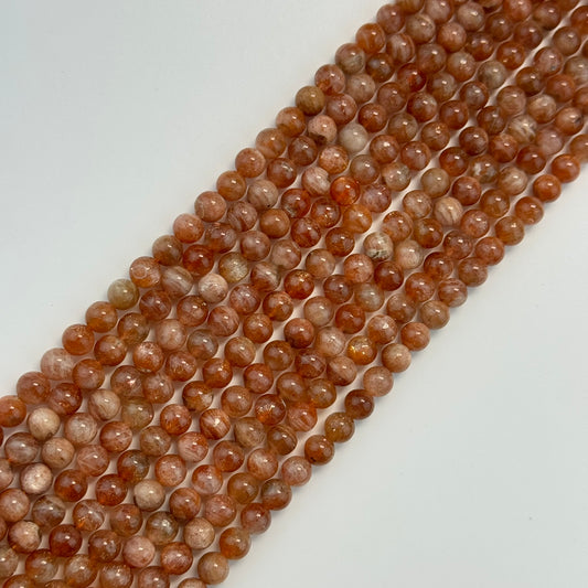 Sunstone Polished Round Beads - (A Quality)