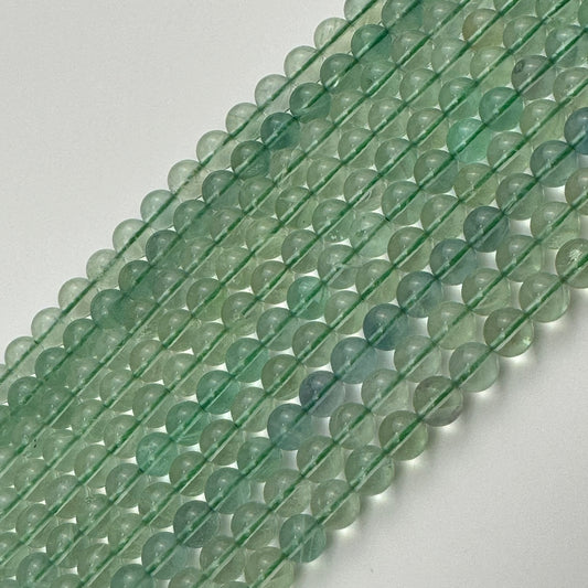 Green Fluorite AA Polished Round Beads image 0