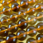 Amber Calcite Polished Round Beads image 3